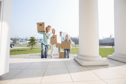 Furniture and boxes prepared for transport by removalists