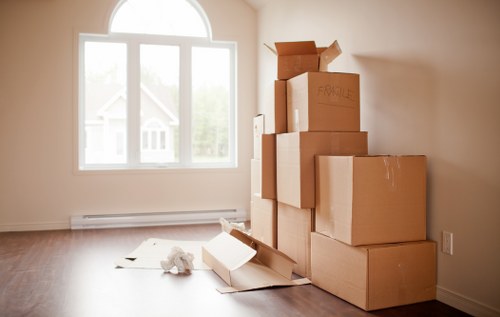 Removal van loading a household move in Cockfosters