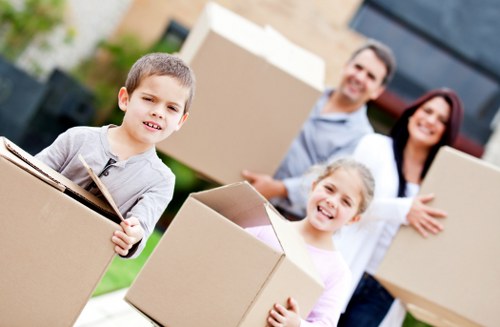 Local movers organising packed household items in Cockfosters