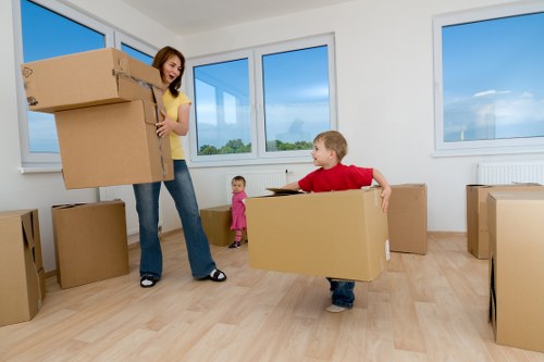 Packed office furniture and files ready for a Cockfosters move